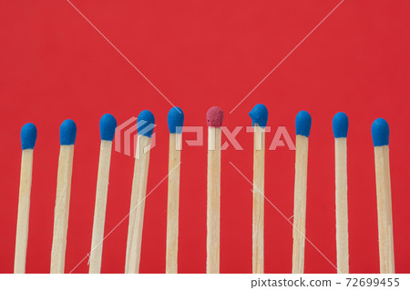 One red match stick standing out from the crowd One red match stick standing out from the crowd 72699455