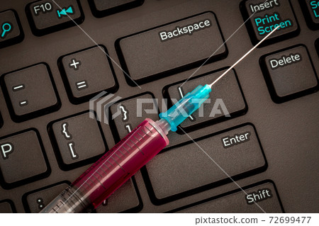 Black keyboard and syringe Black keyboard and syringe 72699477