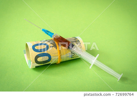 Euro currency with syringe 72699764
