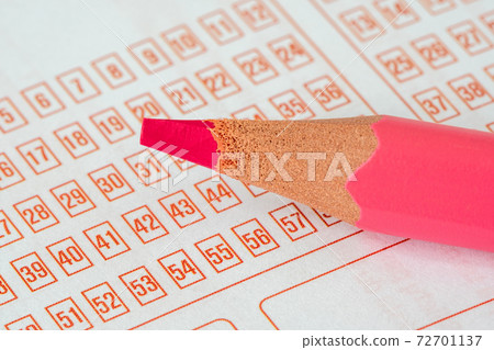 Lottery ticket and pink pencil Lottery ticket and pink pencil 72701137