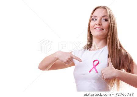 woman pink cancer ribbon on chest making thumb up woman pink cancer ribbon on chest making thumb up 72703787