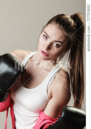Feminist woman training, boxing. Feminist woman training, boxing. 72703802