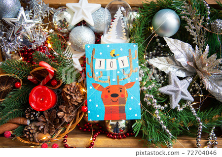 Christmas background. Beautiful card with a deer - joy inscription. Christmas background. Beautiful card with a deer - joy inscription. 72704046