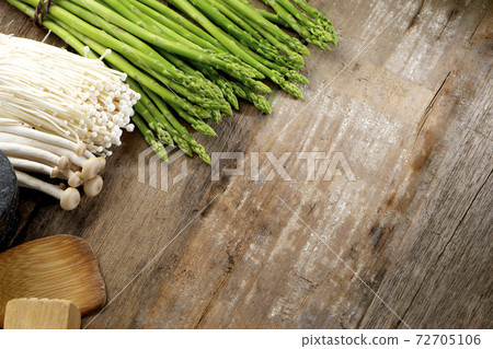 Group of fresh asparagus with golden needle mushroom Group of fresh asparagus with golden needle mushroom 72705106