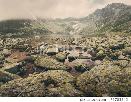 Hincovo pleso and the High Tatras mountain range. 72705243