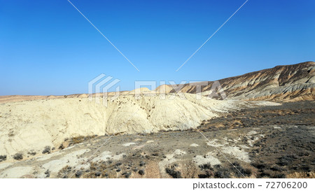 Colored hills of the gorge in the desert. Colored hills of the gorge in the desert. 72706200