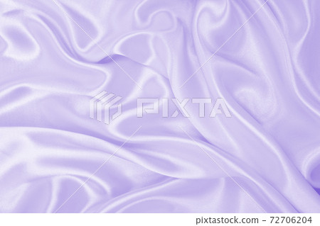 Smooth elegant lilac silk or satin texture as wedding background. Luxurious background design Smooth elegant lilac silk or satin texture as wedding background. Luxurious background design 72706204