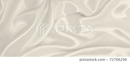 Smooth elegant golden silk or satin luxury cloth texture as wedding background. Luxurious background design. In Sepia toned. Retro style Smooth elegant golden silk or satin luxury cloth texture as wedding background. Luxurious background design. In Sepia toned. Retro style 72706206