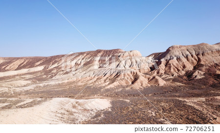 Colored hills of the gorge in the desert. Colored hills of the gorge in the desert. 72706251