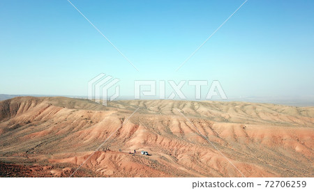 Colored hills of the gorge in the desert. Colored hills of the gorge in the desert. 72706259