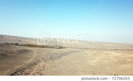Colored hills of the gorge in the desert. Colored hills of the gorge in the desert. 72706263