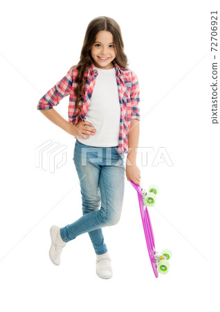 Trendy girl. Summer vacation. Kid having fun with penny Trendy girl. Summer vacation. Kid having fun with penny 72706921