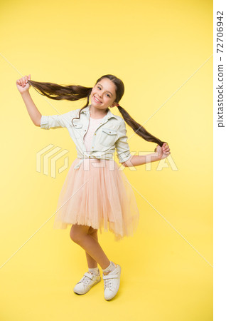 Long hair tips for kids. Kid girl charming ponytail hairstyle Long hair tips for kids. Kid girl charming ponytail hairstyle 72706942