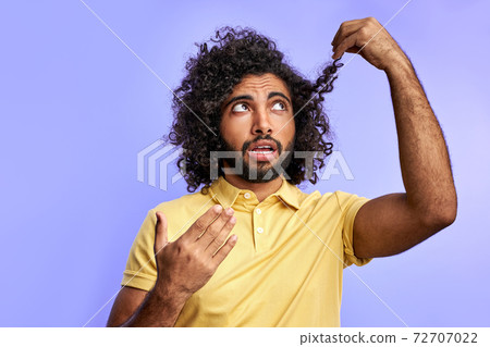 funny arabic man is thinking about barber 72707022