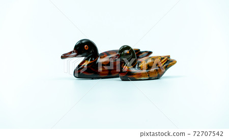 Two happy duck decorations made of wood 72707542