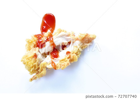 crispy fried chicken meat with bread crumb and egg yolk dressing ketchup on white background 72707740