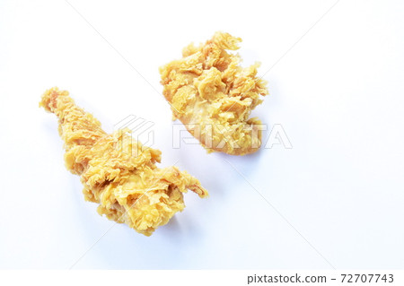 crispy fried chicken meat with bread crumb and egg yolk on white background 72707743