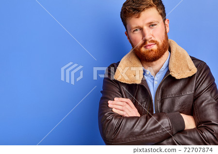 sad upset caucasian male in coat is frozing sad upset caucasian male in coat is frozing 72707874