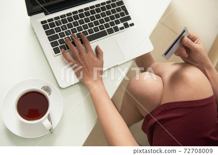 Woman shopping online Woman shopping online 72708009