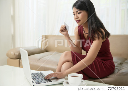 Woman shopping online Woman shopping online 72708011