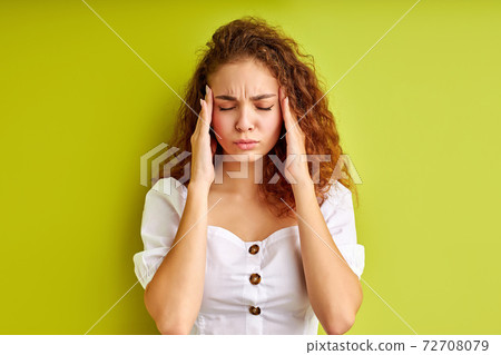 head of girl is bursting with thoughts, isolated over green background head of girl is bursting with thoughts, isolated over green background 72708079