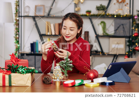 Woman with baubles package Woman with baubles package 72708621