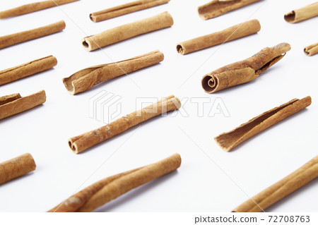 Cinnamon close up on a white background 72708763