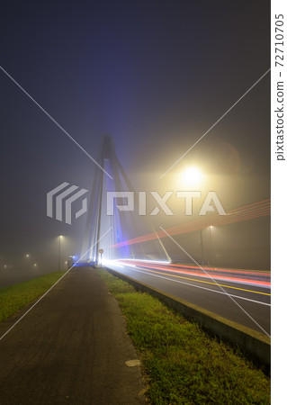 bridge over water whit fog 72710705