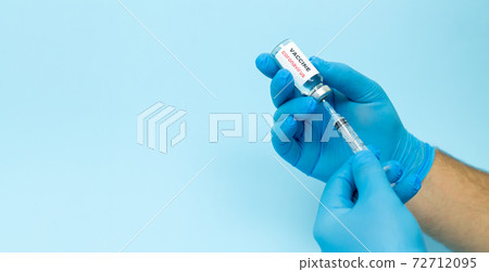 Coronavirus or COVID-19 vaccine. Doctor holding vaccine against corona virus for prevent infection 72712095