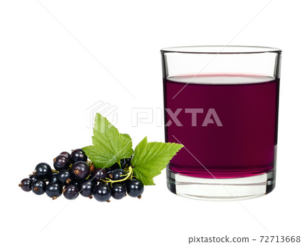 Currant drink in a glass with berries currants Currant drink in a glass with berries currants 72713668