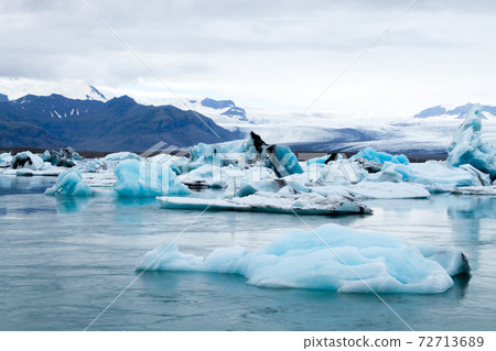 Icebergs on water, Jokulsarlon glacial lake, Iceland Icebergs on water, Jokulsarlon glacial lake, Iceland 72713689