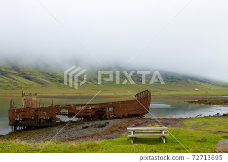 Shipwreck from Mjoifjordur fiord, east Iceland. Icelandic panorama Shipwreck from Mjoifjordur fiord, east Iceland. Icelandic panorama 72713695