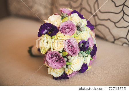 Wonderful luxury wedding bouquet of different flowers Wonderful luxury wedding bouquet of different flowers 72713735