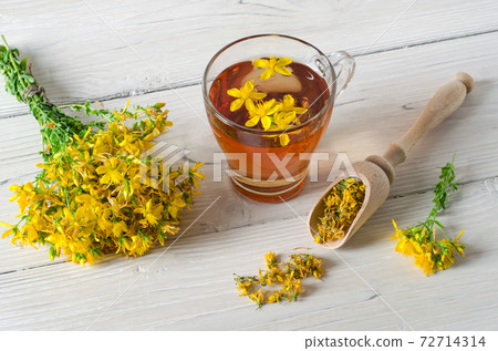 St. John's wort tea and Hypericum flowers 72714314
