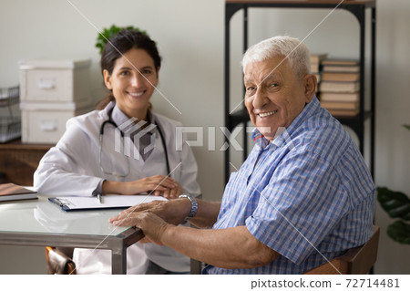 Portrait of smiling elderly male patient at consultation in clinic Portrait of smiling elderly male patient at consultation in clinic 72714481