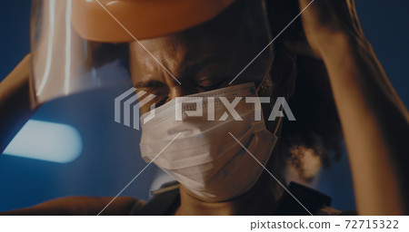 Hardworking female laborer after difficult day on manufacture Hardworking female laborer after difficult day on manufacture 72715322