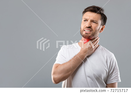 Sick man having sore throat, looking at copy space Sick man having sore throat, looking at copy space 72715717
