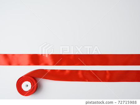 red summer silk and bobbin on white background red summer silk and bobbin on white background 72715988