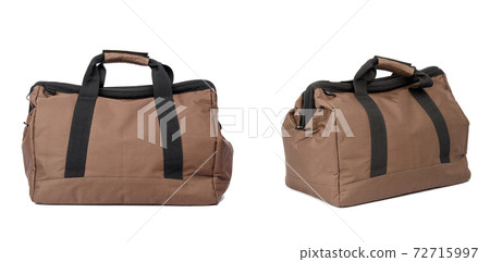 brown textile travel bag with handles isolated on white background 72715997
