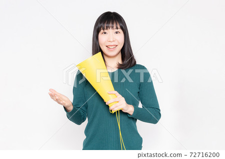 Women who support megaphone 72716200