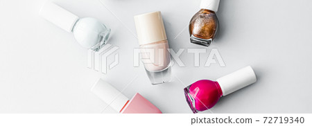 Nail polish bottles on white background, beauty brand 72719340