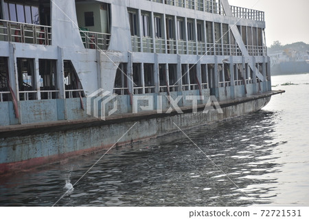 Ferry retro hull and guest rooms parked at Shodol Gat at Dhaka, Bangladesh 72721531