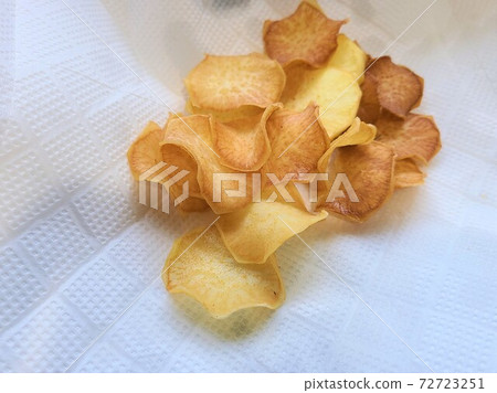 Super easy potato chip making home cooking delicious healthy snack stay home material background Super easy potato chip making home cooking delicious healthy snack stay home material background 72723251