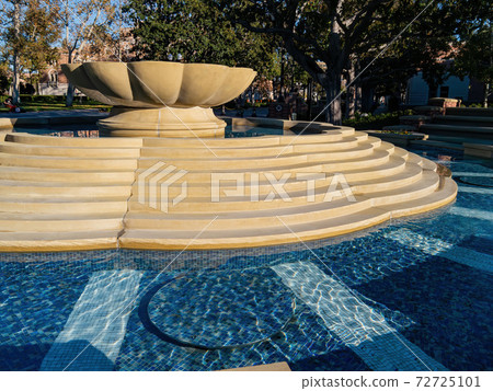Afternoon sunny view of the Patsy and Forrest Shumway Fountain 72725101