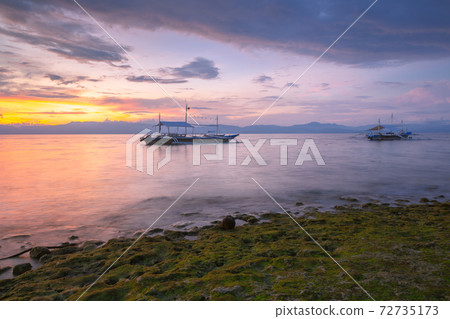 Deamatic sunset over the beach, Philippines Deamatic sunset over the beach, Philippines 72735173