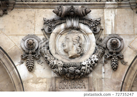 Architectural details of Opera National de Paris: Cimarosa, facade sculpture 72735247