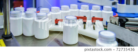 Medical drug plastic bottle transfer on Automated conveyor systems industrial automation for package Medical drug plastic bottle transfer on Automated conveyor systems industrial automation for package 72735436