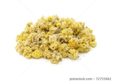 Pile of dried healthy Helichrysum arenarium flowers. Dry immortelle or dwarf everlast heap on white. Alternative medicine. Pile of dried healthy Helichrysum arenarium flowers. Dry immortelle or dwarf everlast heap on white. Alternative medicine. 72735662