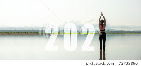 Happy new year start up 2021. Yoga women lifestyle exercise and pose for healthy life. Happy new year start up 2021. Yoga women lifestyle exercise and pose for healthy life. 72735860