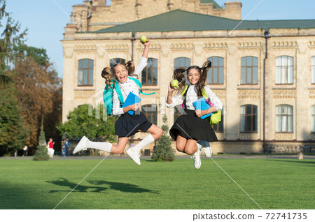 Driven and energetic. Energetic children in midair  72741735